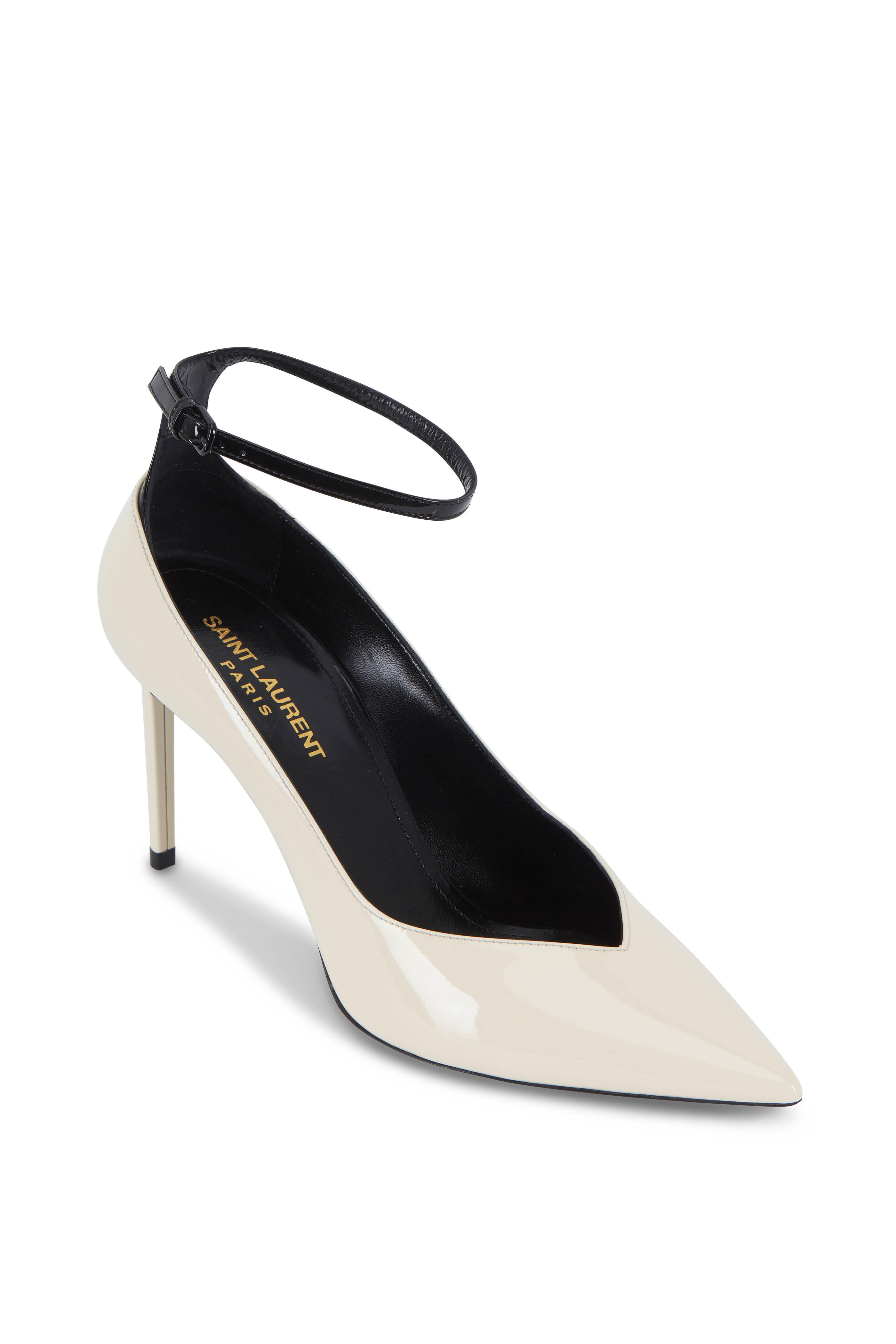 cream and black pumps