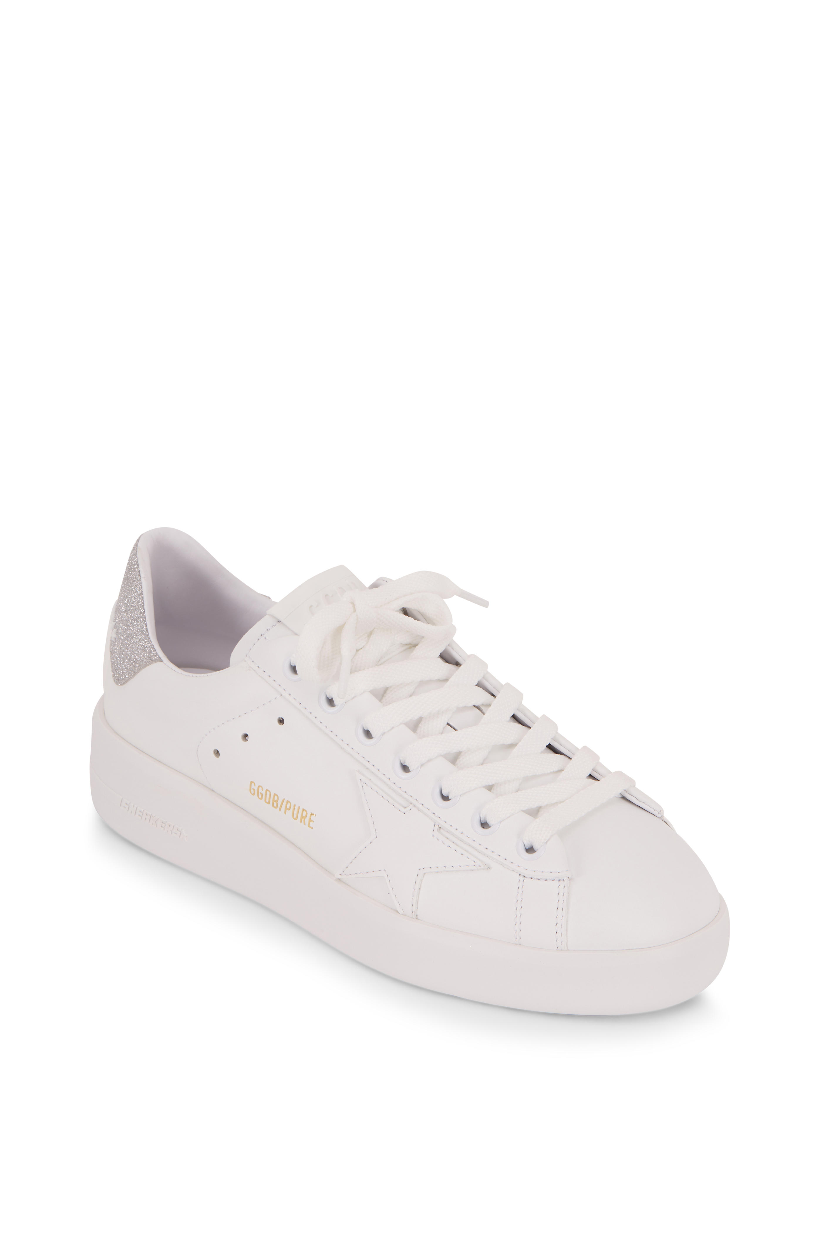 white and silver golden goose sneakers