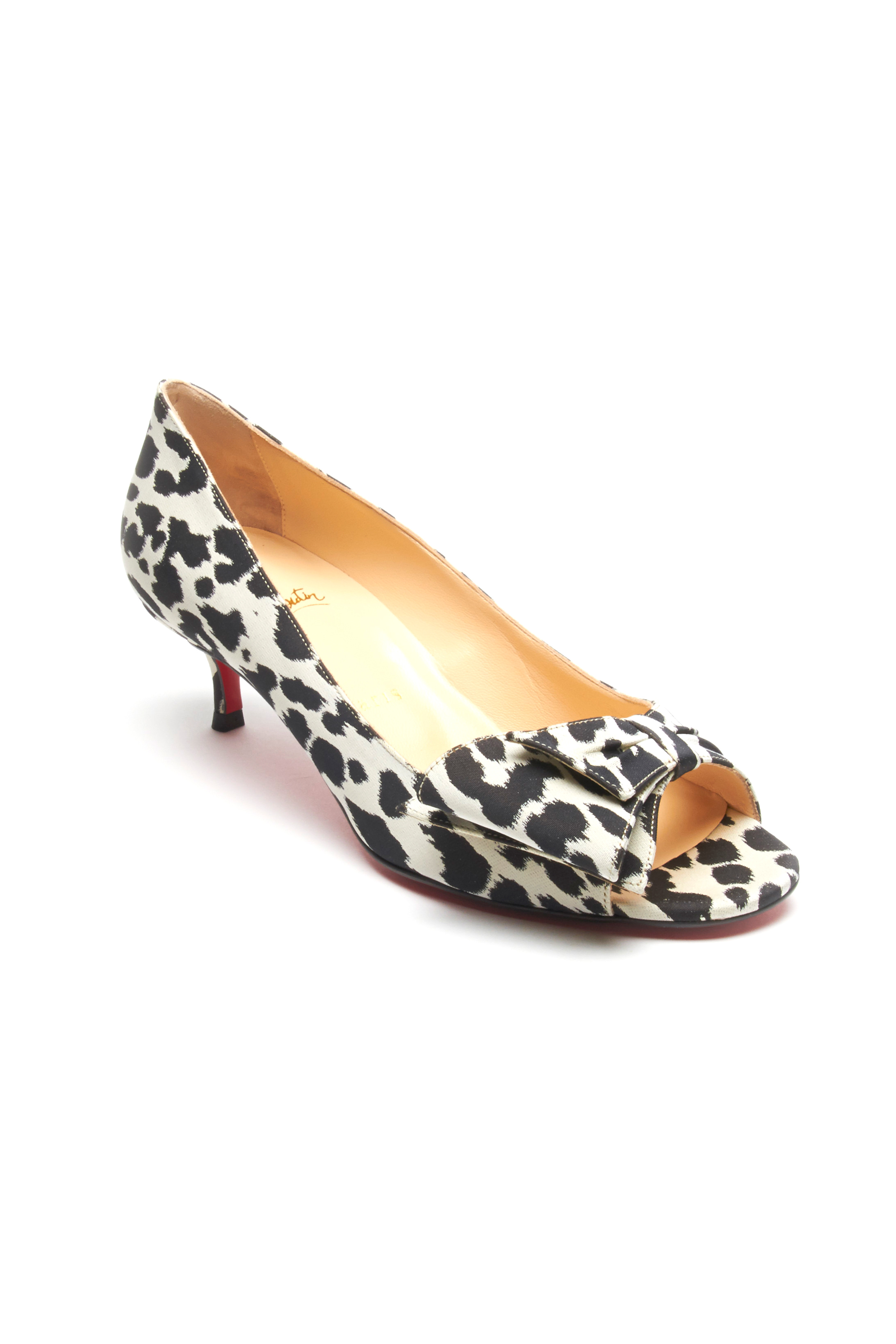 white leopard pumps