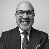 Headshot of David Schuster