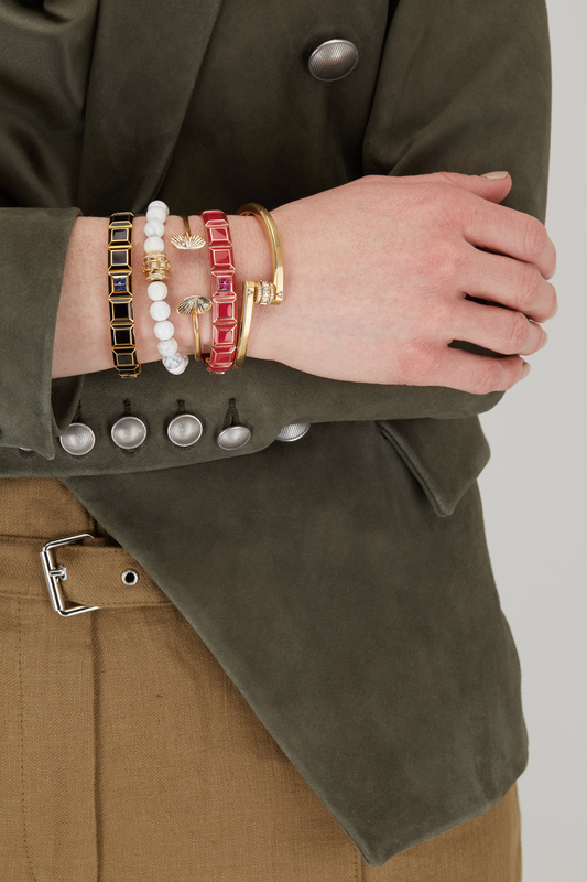A chic stack of bracelets from your favorite designers adds an instant edge to any outfit.  