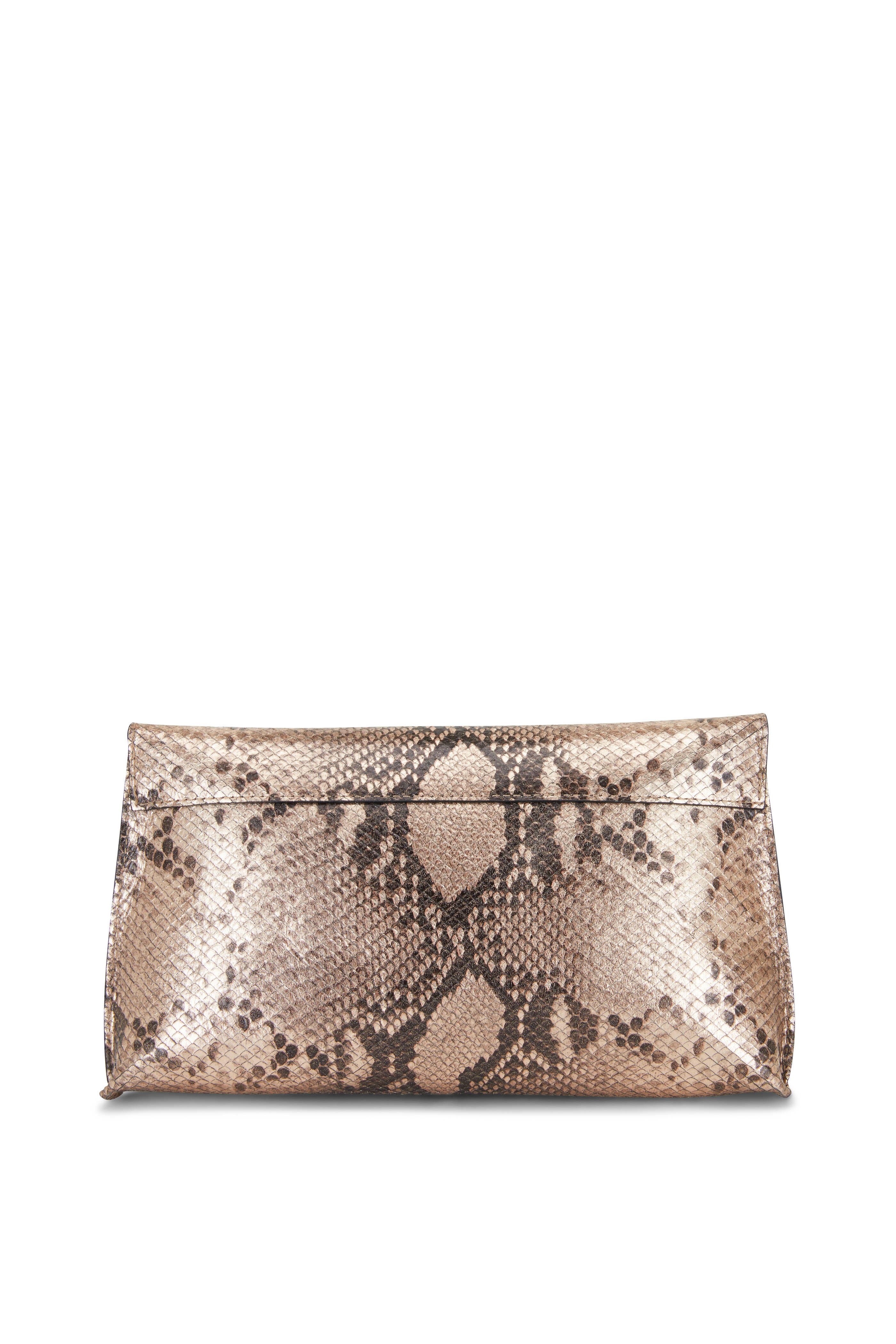 foldover lux printed leopard clutch featured at