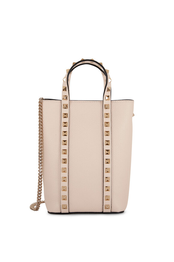 Click here to buy Valentino Rockstud camera leather cross-body bag at  MATCHESFASHION.COM in 2023