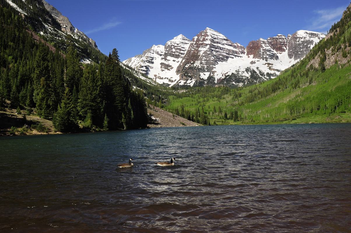 Summer is almost here and the mountains out west are calling. We asked local luxury travel agent Elisa Brown to share